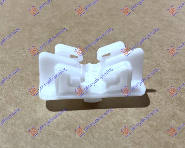 HEAD LAMP BRACKET LOWER PLASTIC